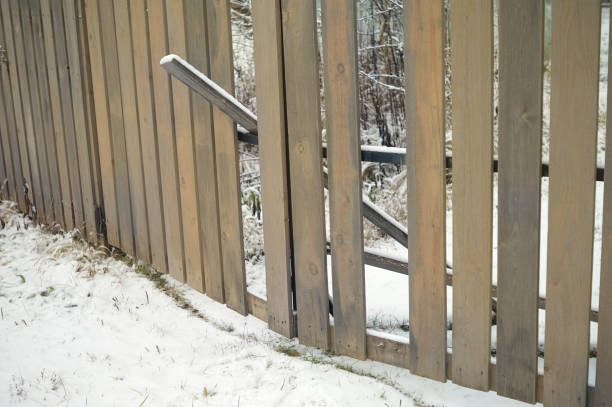 istock Damaged wooden fence 1202666062