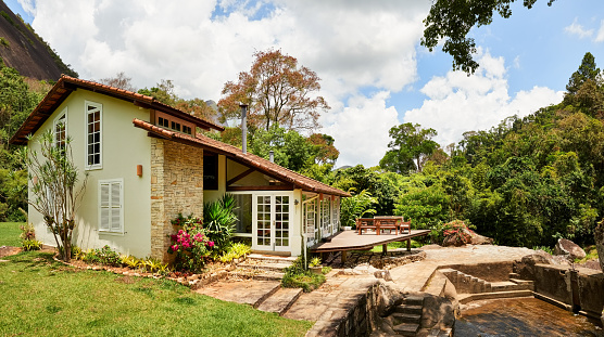 Shot of a beautiful house in middle of nature