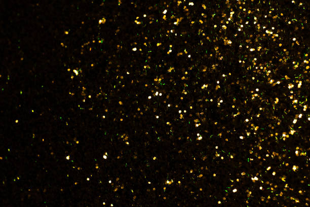 istock Golden glitter christmas shiny abstract background overlay 1202670962