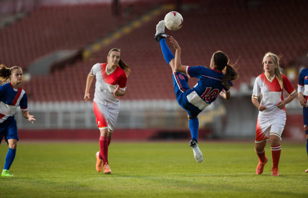 istock Determined bicycle kick on a soccer match! 1202672077
