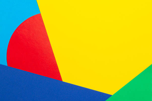 istock Abstract geometric shape yelllow, blue, red, green color paper background 1202673495