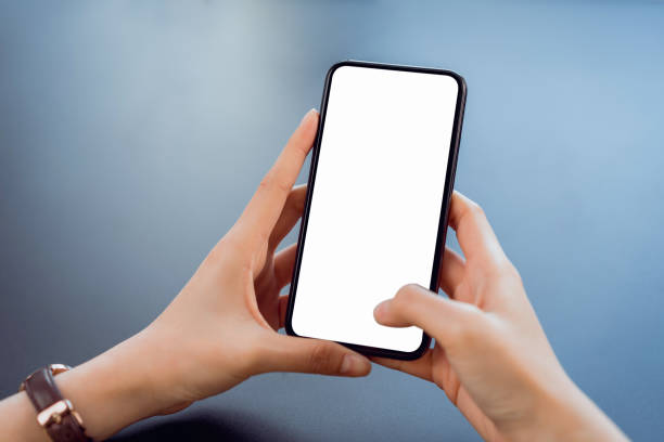istock Woman hand hold smart phone with blank copy space screen for your advertisement. 1202674477