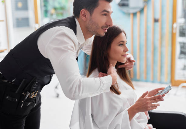 istock Good advice from friendly hairdresser 1202675351