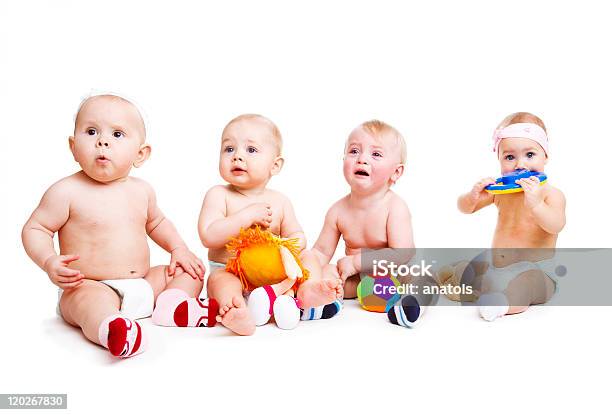 Four Babies Playing Stock Photo - Download Image Now - Crying, Group Of People, Toddler