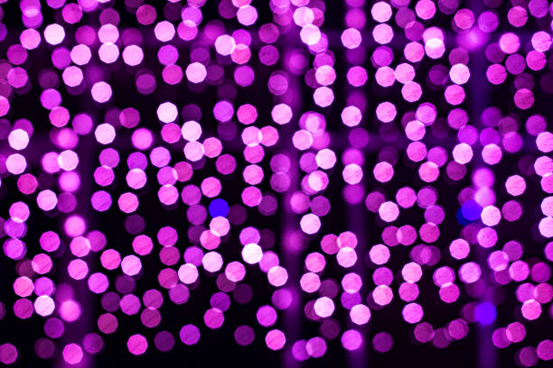 istock abstract blurred of multi-colored glittering shine 1202680481
