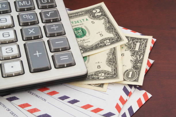 istock Mail delivery and post office service cost concept. 1202680828