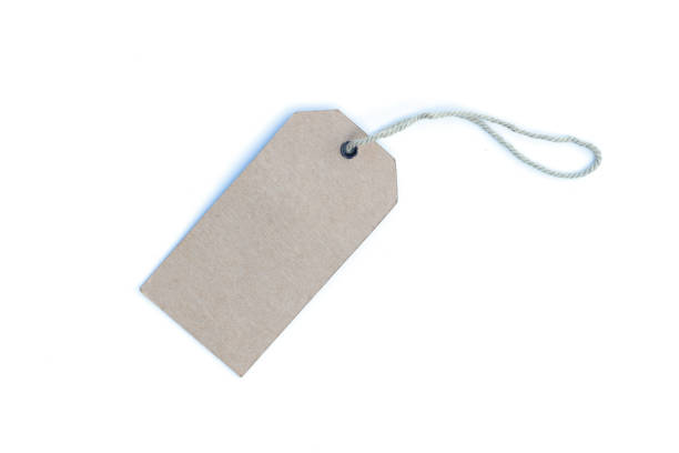 istock Blank brown price tag or label with thread isolated on white background. 1202683029