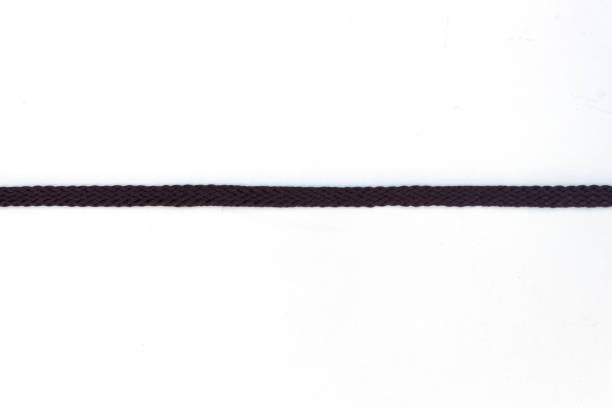 istock Black shoelaces on a white background 1202683106