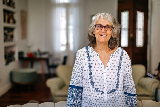 istock Argentinian woman with eyeglasses at home 1202684050