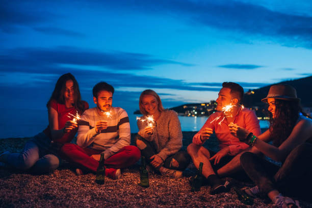 istock Friends having beach party 1202686970