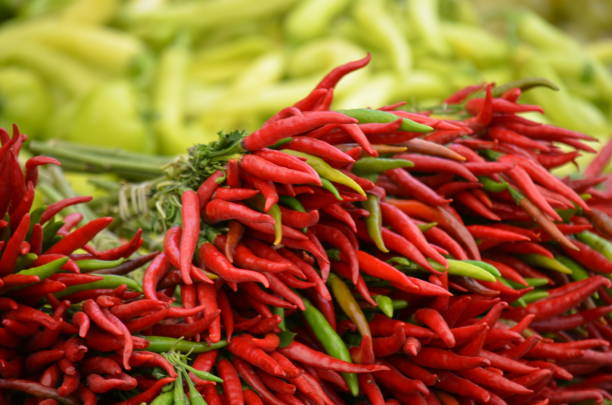 istock fresh red peppers on the market 1202688462