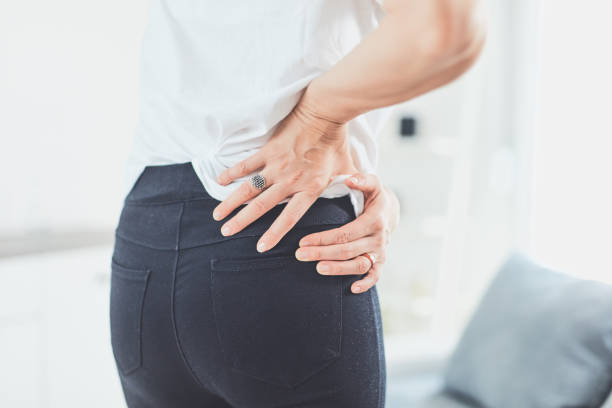 istock Hip, back and spinal problems in adult ages. 1202689458