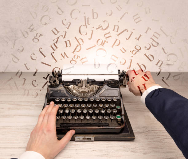 istock First person perspective elegant hand typing with flying letters concept 1202690329