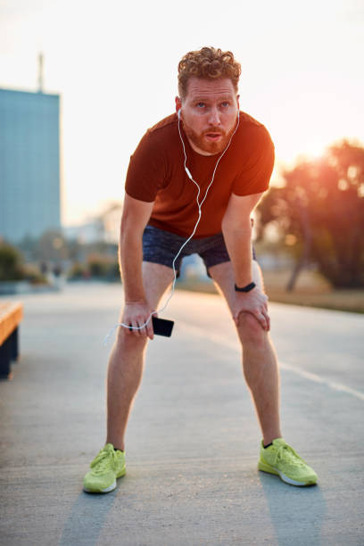 istock Modern young man working out in an urban park. 1202691579