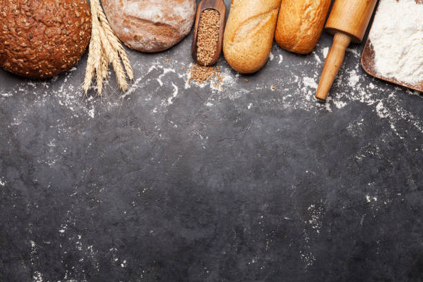 istock Various bread with wheat, flour and cooking utensils 1202691592
