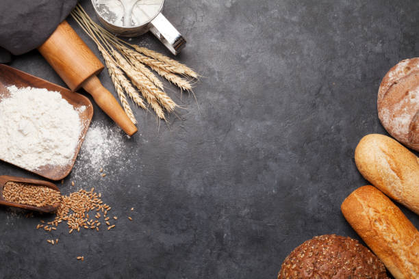 istock Various bread with wheat, flour and cooking utensils 1202691782