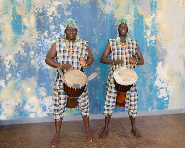 istock Two African musician with traditional clothes and drums 1202693729