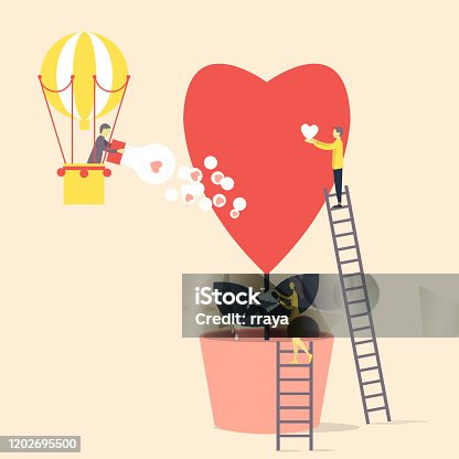 istock Small  people grow and care about love, like a flower. 1202695500