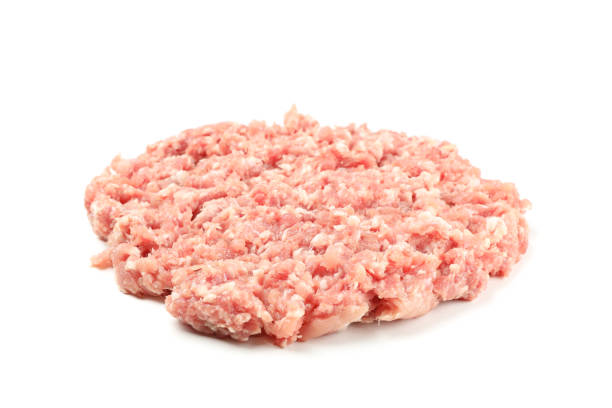 istock Tasty minced meat isolated on white background 1202696816