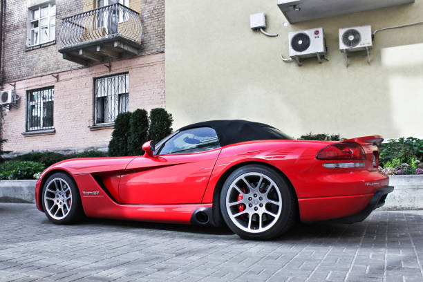 red dodge viper hennessey venom 1000 twin turbo cabrio in the city