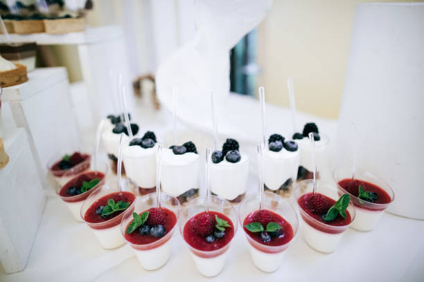 Beautiful Candy bar at wedding ceremony with desserts, cakes