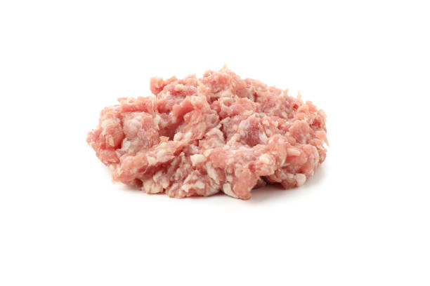 istock Tasty minced meat isolated on white background 1202698119