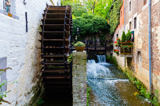 ancient water mill called Leeuwenmolen in Maastricht, The Netherlands with the locks in the background