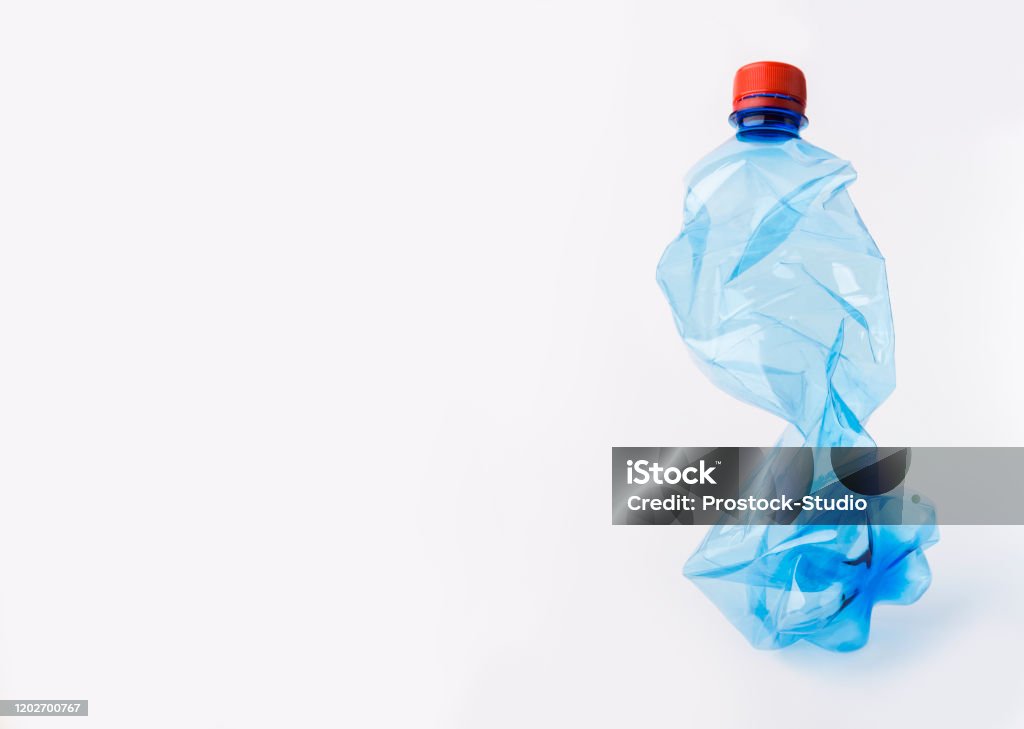 Squashed Plastic Crumpled Or Squashed Blue Plastic Bottle Isolated On White Stock Photo ...