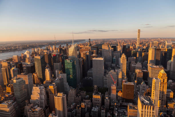 istock sunset in New York from the Empire State Building 1202703596