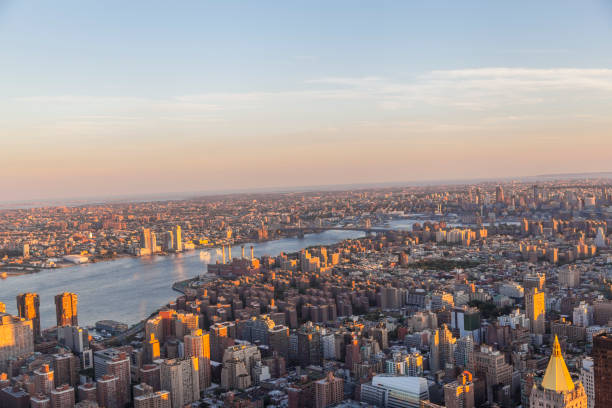 istock sunset in New York from the Empire State Building 1202703666