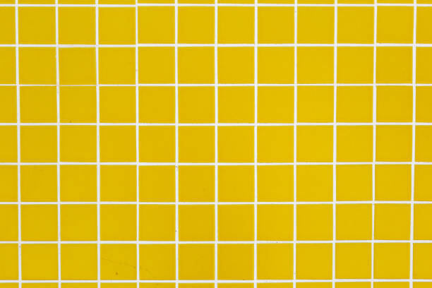 istock background of yellow squares with white line between them 1202703670