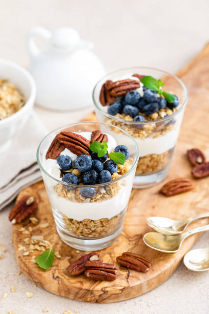istock Blueberry layered parfait with ricotta cheese, granola and pecan nuts 1202706050