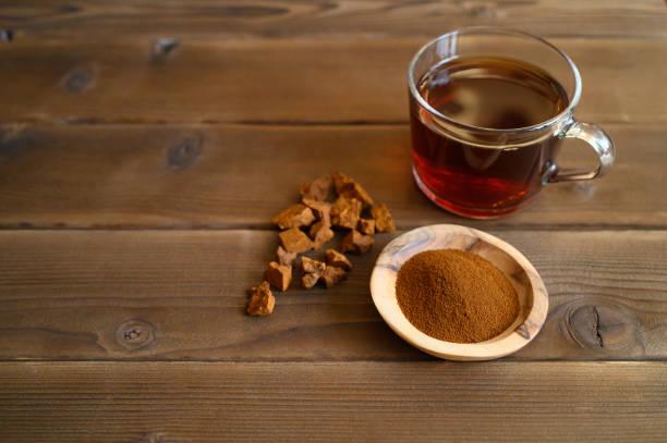 istock chaga tea mushroom from birch tree using for healing tea or coffee in folk medicine. ground powder 1202706066