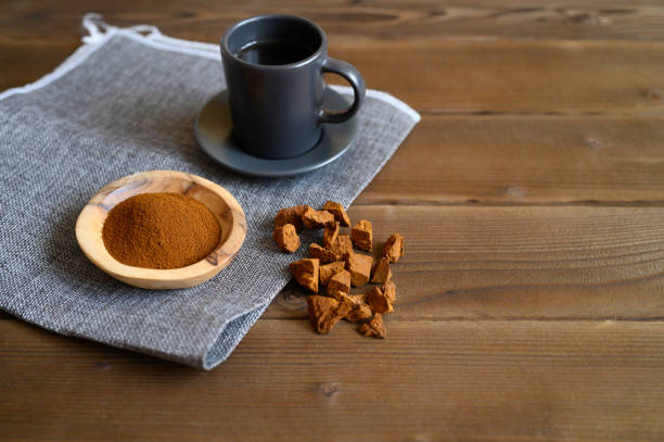 istock chaga tea mushroom from birch tree using for healing tea or coffee in folk medicine. ground powder 1202706179