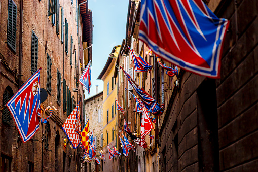 Banners of the contrads in Siena. Feast Palio. Region of Tuscany, Italy, europe