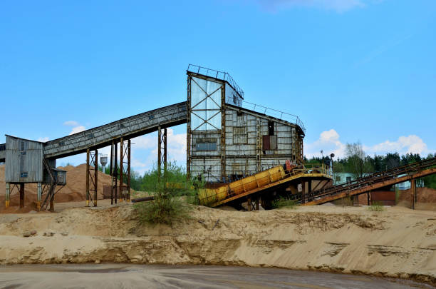 Crushing factory, machines and equipment for crushing, grinding stone, sorting sand and bulk materials. Sand Making Plant in mining quarry. Crushing factory, machines and equipment for crushing, grinding stone, sorting sand and bulk materials. mine washer stock pictures, royalty-free photos & images