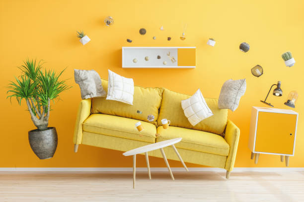zero gravity yellow living room - cair no sofá imagens e fotografias de stock