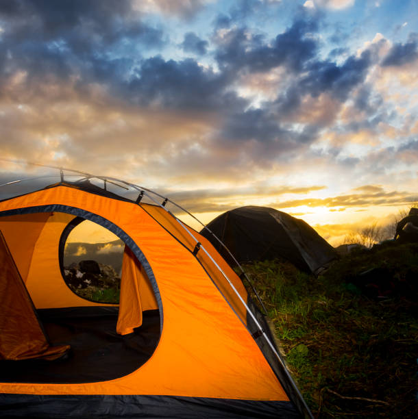 istock touristic tent at the sunset 1202724860