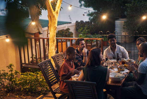 istock What's more social than a dinner party at sundown? 1202731805