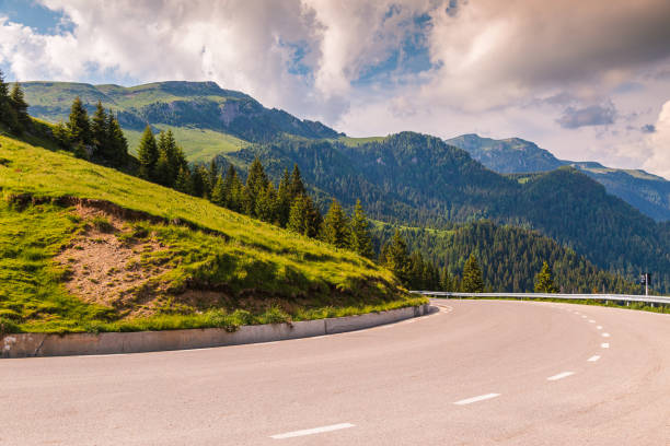 istock Asphalt road that passes through the Bucegi mountains in Romania 1202732659