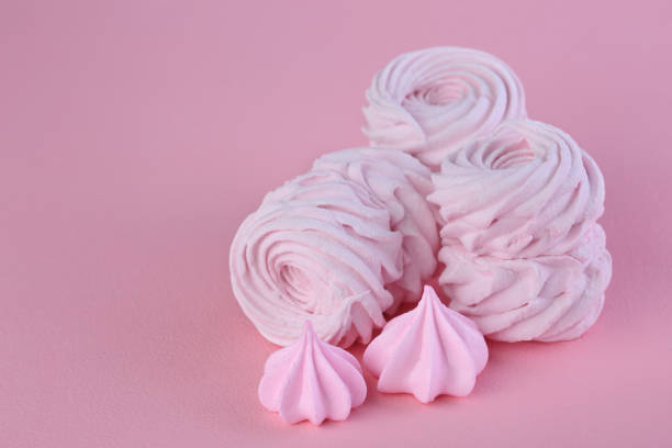 istock Homemade marshmellow on pink background. Closeup 1202732710