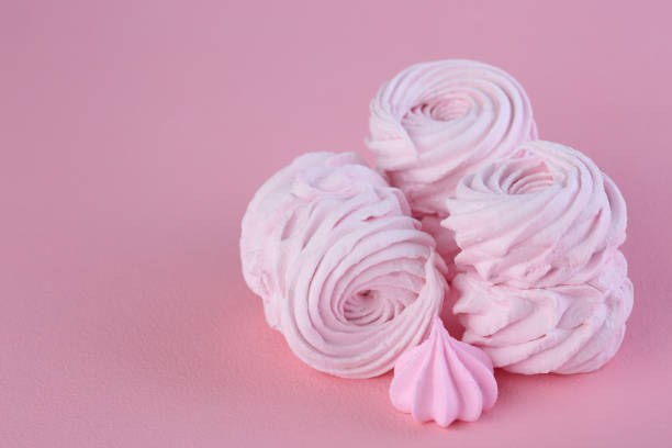 istock Homemade marshmellow on pink background. Closeup 1202732885