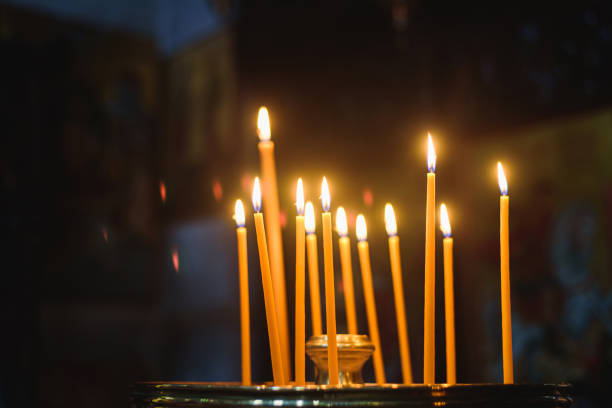 istock Candles in orthodox church 1202733800