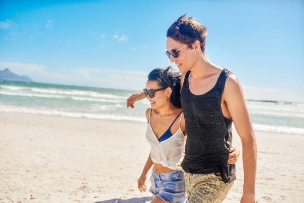 istock We're getting closer over a stroll on the beach 1202736562