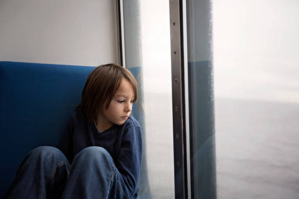 istock Children, playing on a ferry boat while traveling 1202737727