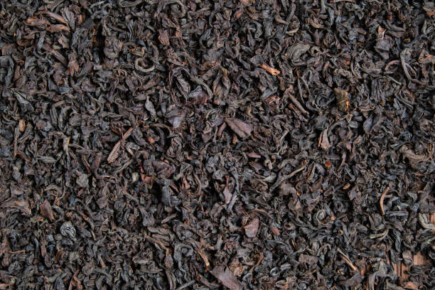 istock The texture and background of black tea. Top view. 1202738197