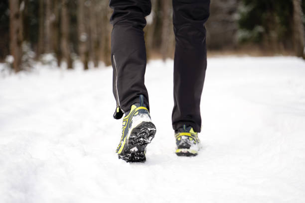 istock Image from back of running man in sneakers 1202738341