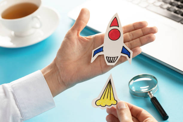 istock Business Person with Startup Rocket 1202740352