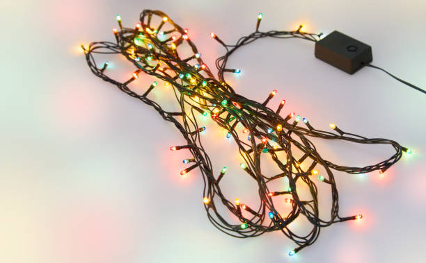 istock Colorful glowing Christmas lights. Holiday background. 1202747027