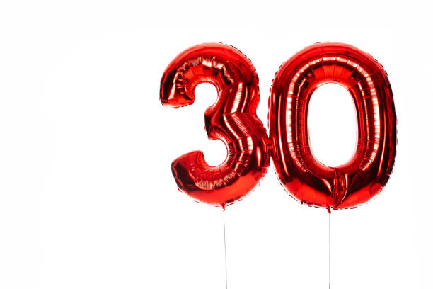 istock number 30 red balloons isolated on white 1202747033